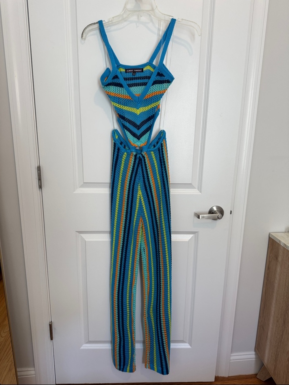 Almost Famous Blue Striped Crochet Jumpsuit with Yellow & Teal Accents